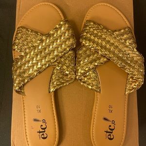 Women’s size 10 gold slip on sandals